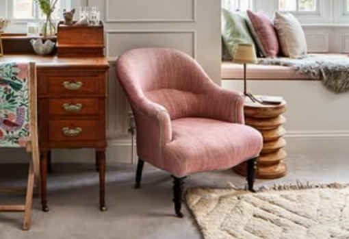 circular-economy-finished armchair Fully refurbished and newly upholstered armchair taking pride of price back in a customer's living room.