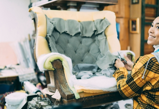 circular-economy-strippe-chair Old Armchair being stripped off it's original materials and prepped ready for re-covering by an upholsterer.