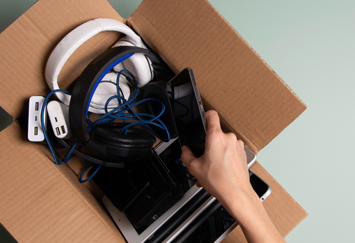 Pile of un-used glasses ready for donation