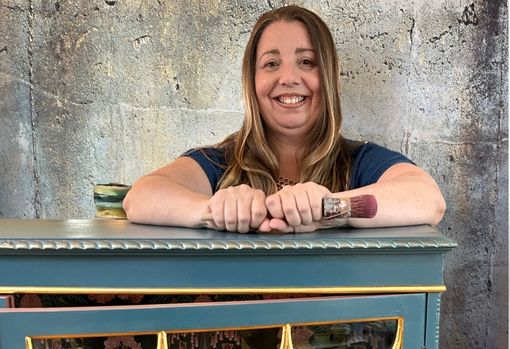 Woman donating a pile of books