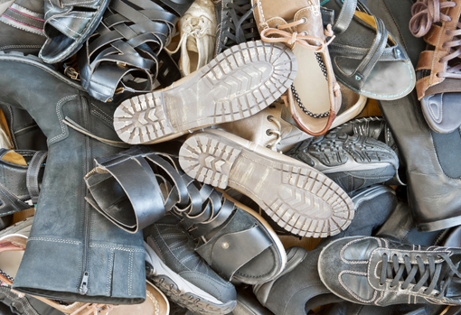 Woman sorting through donated clothing
