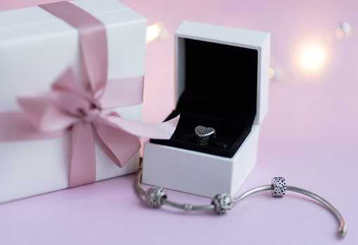 Restored piece of family jewellery displayed in a gift case