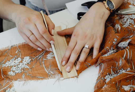 Woman repairing clothing