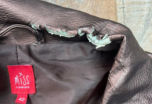 PVC jacket with badly damaged collar