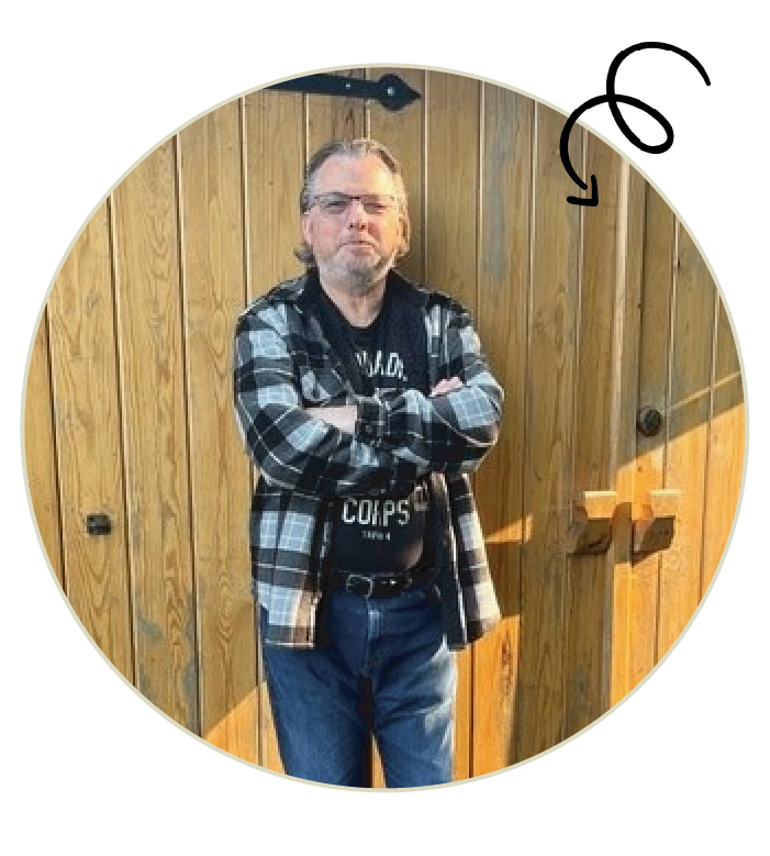 We Are Repairs founders Ally Booker and Gemma Broad leaning against a graffitied wall in central Nottingham.