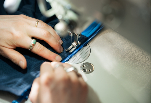 zip-repair-01 Zip being repaired on jacket